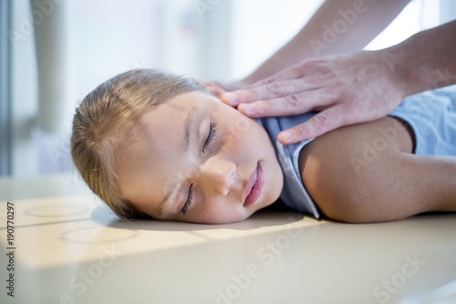 Girl being positioned for X-ray