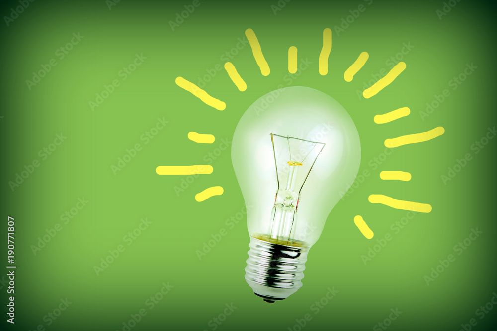 Light bulb on green background Light bulb on green background