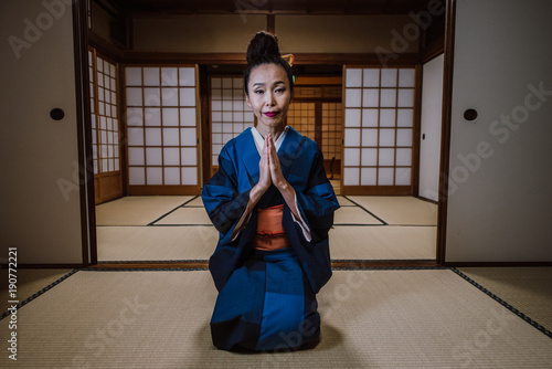 Beautiful japanese woman in a traditional japanese house
