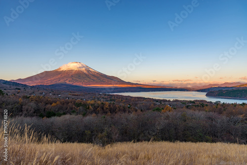 Mountain Fuji with snow cover the peak and lake Yamanakako in early morning view from 360 panoramic view point.