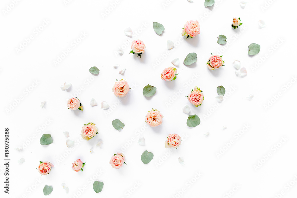Floral pattern made of pink roses, green leaves, branches on white background. Flat lay, top view. Valentine's background. Floral pattern. Pattern of flowers. Flowers pattern texture Floral pattern made of pink roses, green leaves, branches on white background. Flat lay, top view. Valentine's background. Floral pattern. Pattern of flowers. Flowers pattern texture