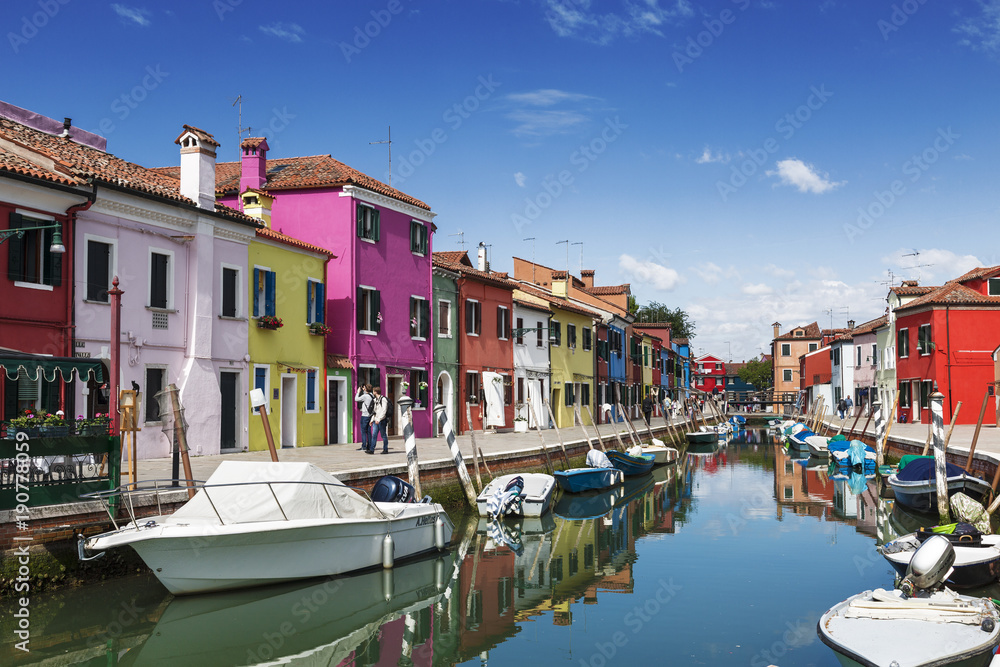 Bright colorful houses on Burano island on the edge of the Venetian lagoon. Venice, Italy