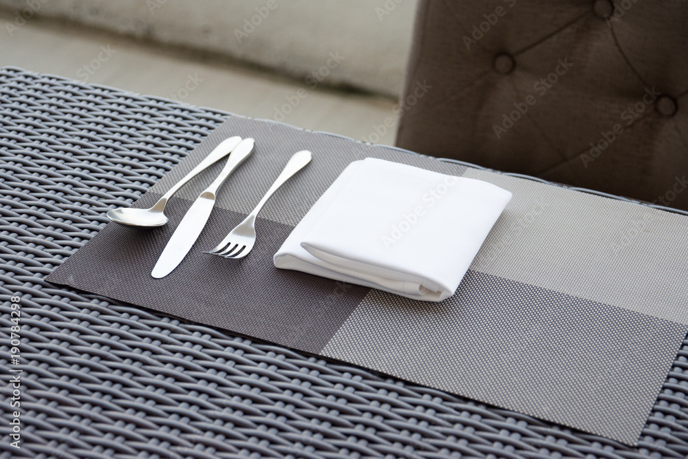 Luxurious fork and spoon on the dining table Luxurious fork and spoon on the dining table