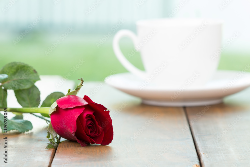 Cute little white cup of coffee with red rose flower on wooden table and  home garden background. Romantic table setting, Valentine day celebration,  Love concept, Positive thinking concept. Photos | Adobe Stock