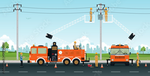 Electrician works on a basket crane with a city backdrop.