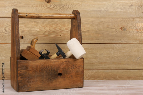 wooden box of carpenter tools
