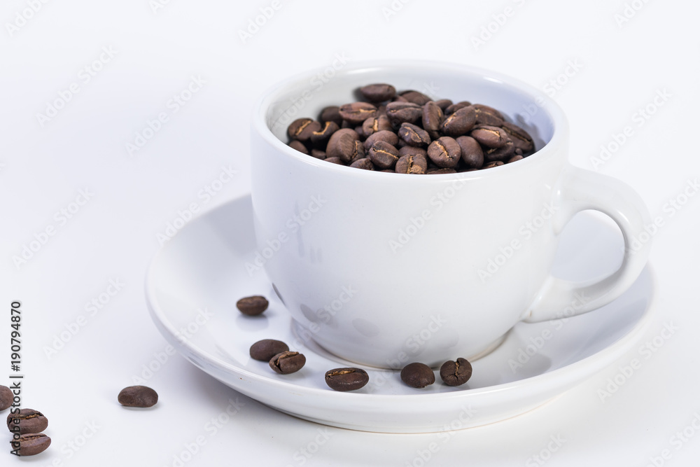 Coffee or espresso cup with coffee beans plain white background Coffee or espresso cup with coffee beans plain white background