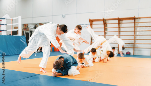 Kid judo, childrens in kimono training martial art