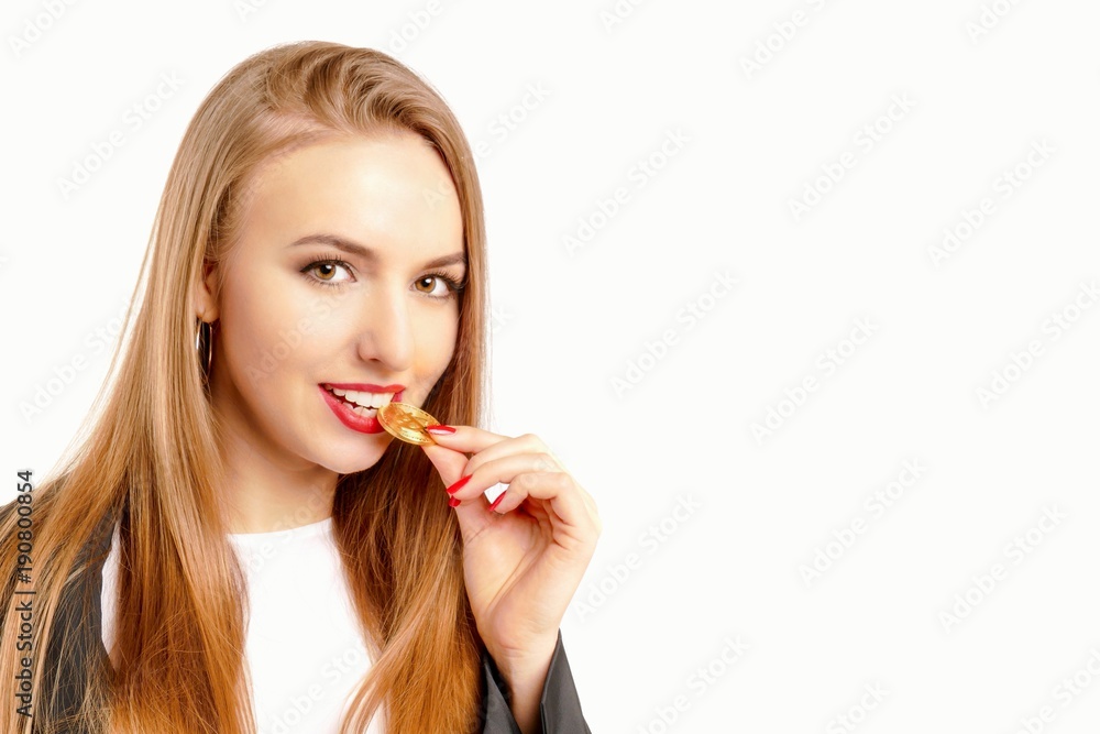 Happy woman holding a Golden Bitcoin Happy woman holding a Golden Bitcoin