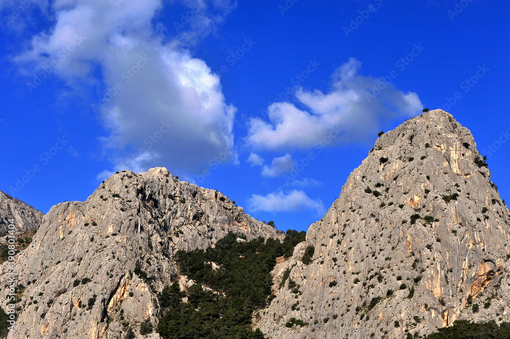 Two beautiful mountains and blue sky Two beautiful mountains and blue sky