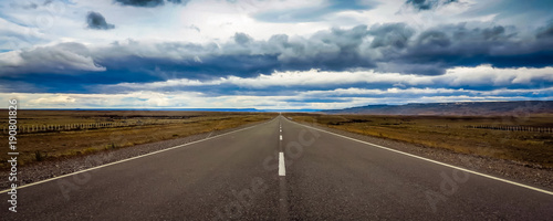 Straight and endless road in Patagonia, Argentina photo