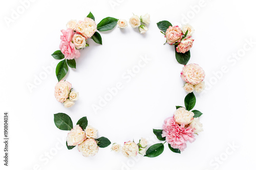 Floral round frame wreath made of pink and beige peonies flower buds, eucalyptus branches and leaves isolated on white background. Flat lay, top view. Frame of flowers. Floral background. Valentine's 