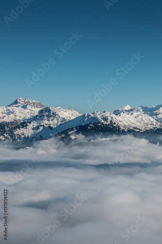 Snow on the top of the mountains and fog down the valley © Hacki Hackisan