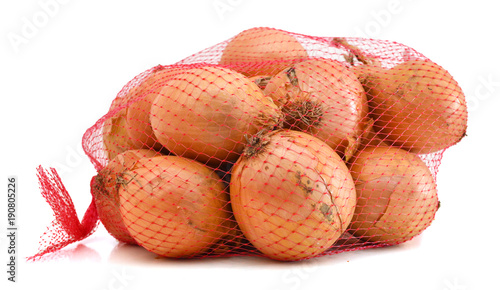 Onions isolated on white in a fishnet.