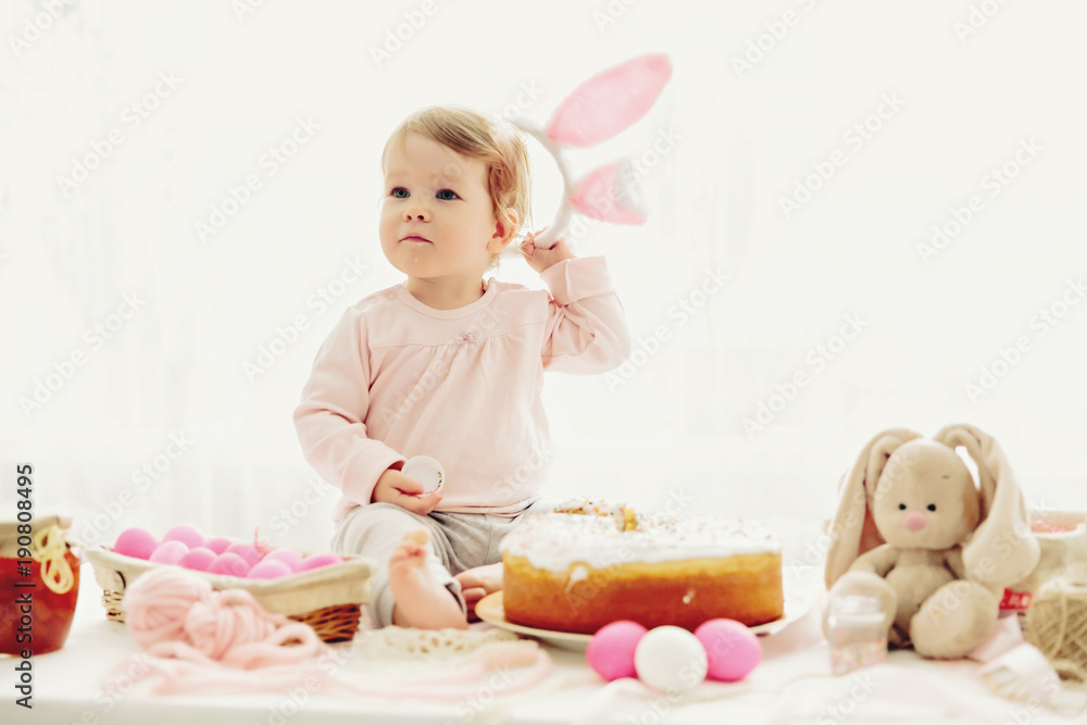 little girl eating cake for Easter