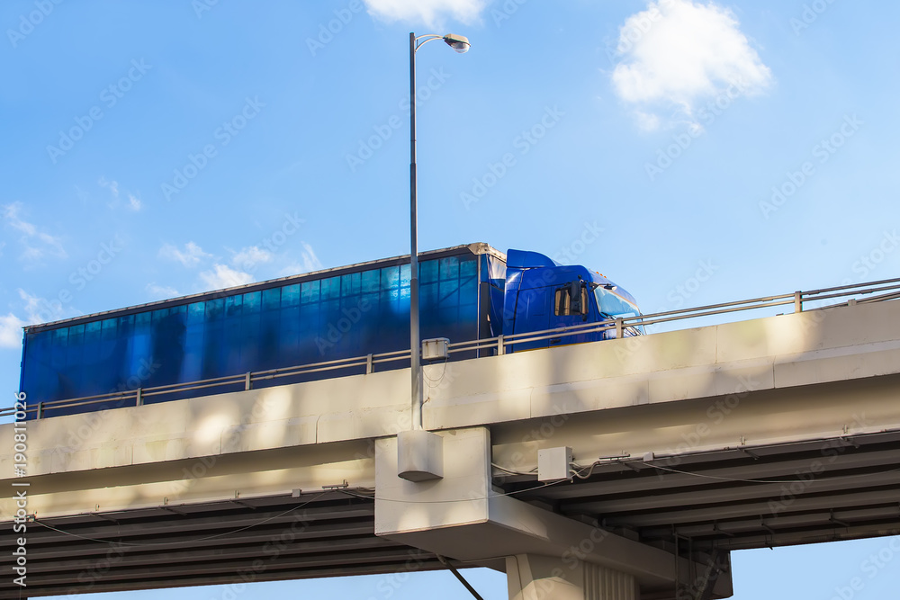 Obraz premium truck delivers freight on bridge