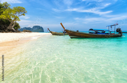 Amazing view of beautiful beach with traditional thailand longtale boat. Location: Bamboo island, Krabi province, Thailand, Andaman Sea. Artistic picture. Beauty world. © olenatur