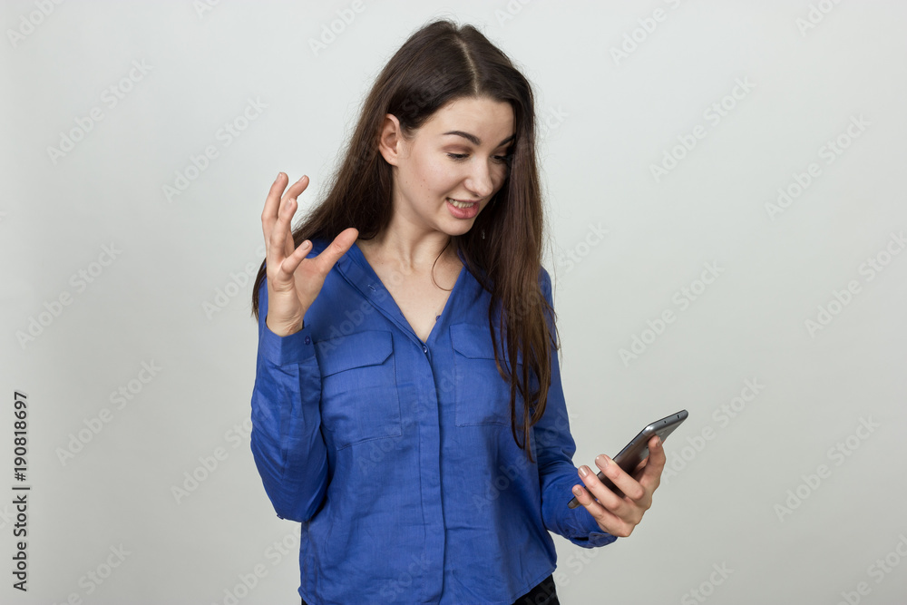 Woman using a cell phone and nervous Woman using a cell phone and nervous