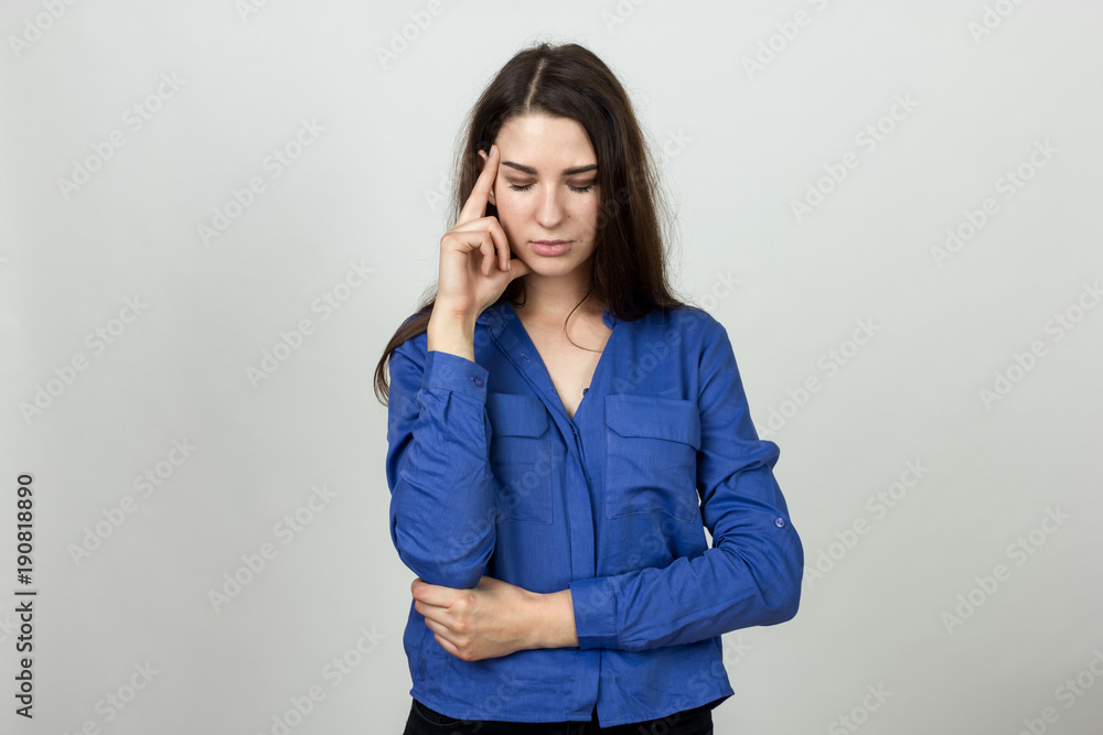 Portrait of a pretty woman stress and headache having migraine pain Portrait of a pretty woman stress and headache having migraine pain