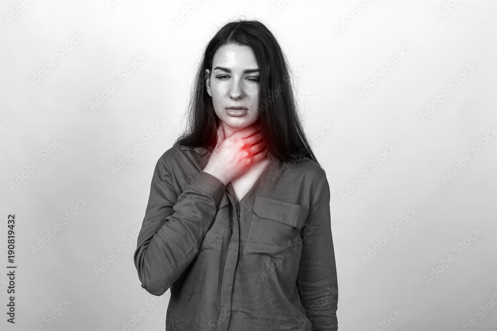 Young woman with sore throat black and white with red accen Young woman with sore throat black and white with red accen
