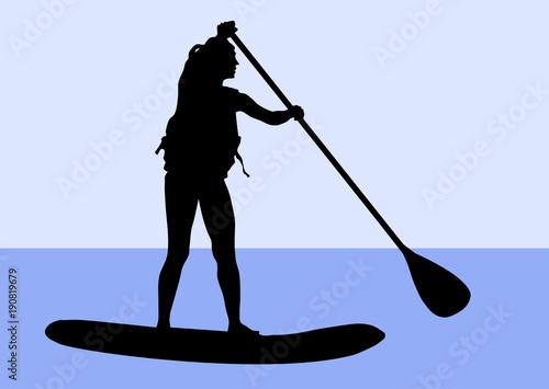 Silhouette of a female standup paddler