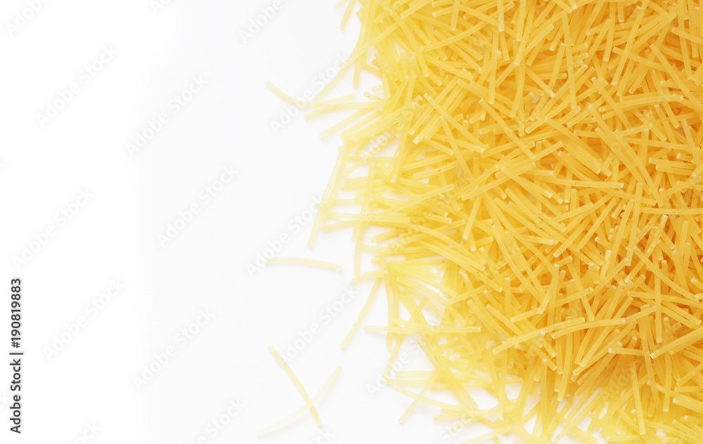 Vermicelli isolated on the white background, pasta, macaroni, noodles. Traditional food. Top view, close-up