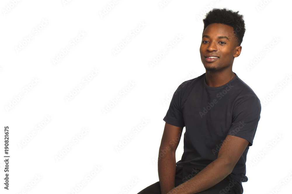 young man relaxing sitting pensive positive attitude studio style young man relaxing sitting pensive positive attitude studio style