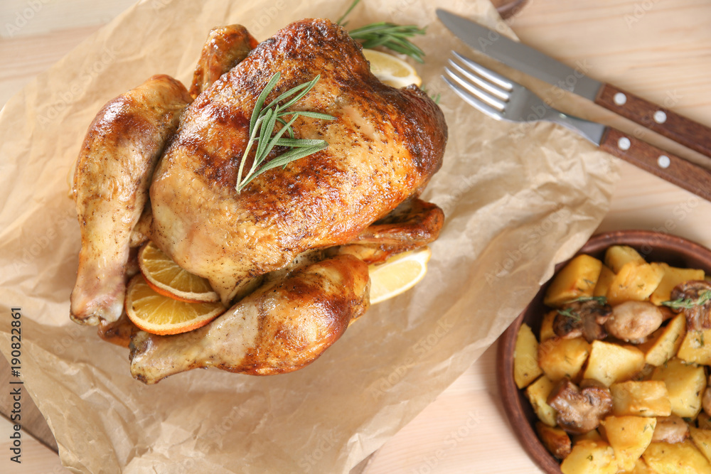 Delicious whole roasted chicken served on table Delicious whole roasted chicken served on table