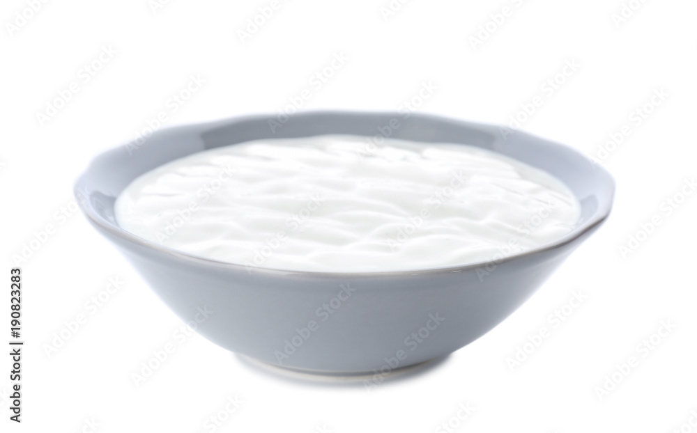 Tasty yogurt in dish on white background Tasty yogurt in dish on white background