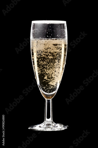 The champagne glass on black background.