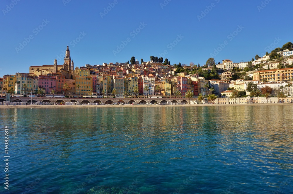 Landscape view of the colorful French Riviera city of Menton in the Alpes Maritimes seen from the Mediterranean Sea