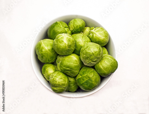 White Ceramic Bowl of Fresh Green Brussels Sprouts