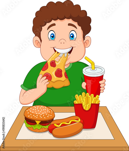 Fat boy eating junk food