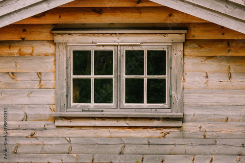 Old vintage dark wooden window  rural design concept.