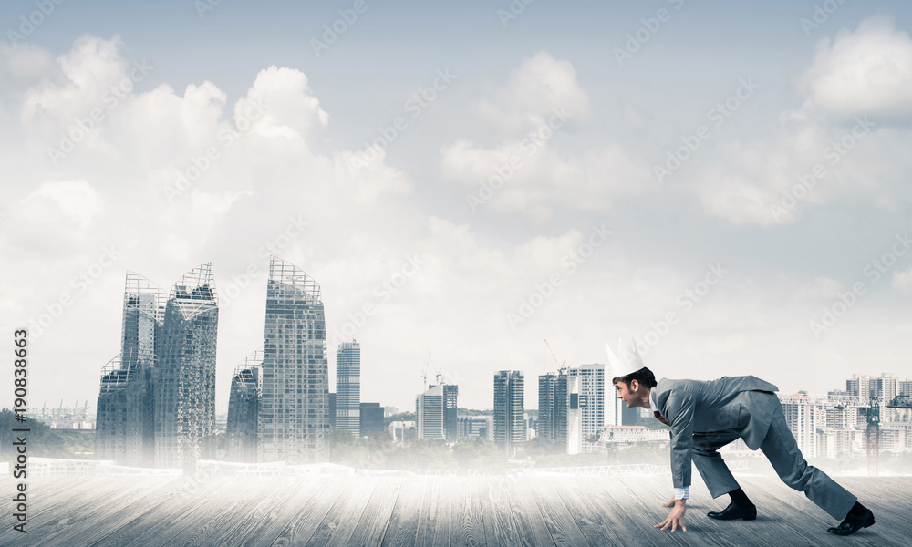 King businessman in elegant suit running and modern cityscape at King businessman in elegant suit running and modern cityscape at