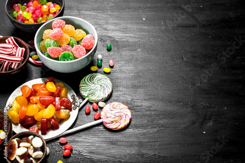 Different sweet candy, jelly and candied in a bowl.