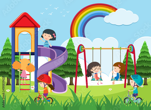 Happy children playing in playground