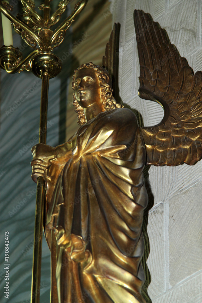 Obraz premium Angel candlestick made of copper