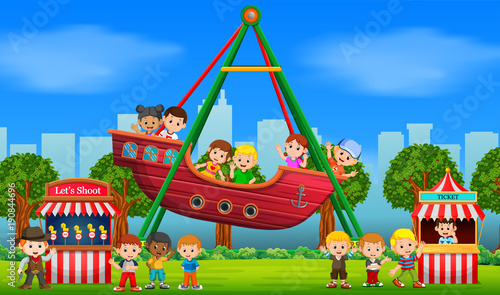 Childrens having fun in carnival at daytime