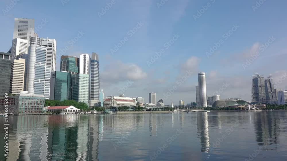 Marina Bay in Singapore and Skyscrapers. Fast Motion Marina Bay in Singapore and Skyscrapers. Fast Motion
