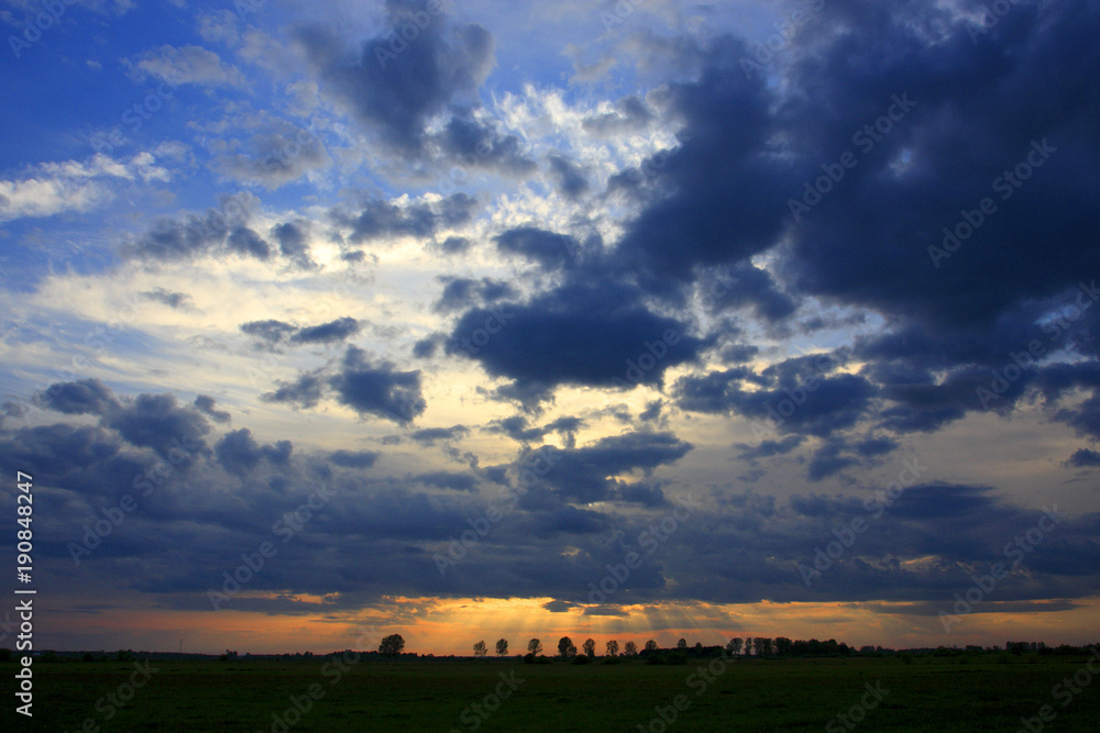 Panoramic view of colorful sunset over wetlands and meadows wildlife refuge by the Biebrza river in Poland