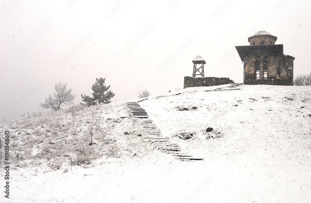 old Orthodox, ruined church in the snow

