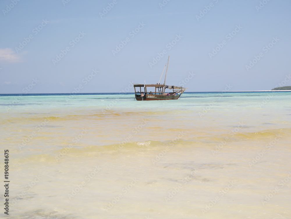 Island in the Indian Ocean, boat in the ocean, sailboat in the ocean, beautiful Indian ocean, beautiful landscape, horizon of the earth, beautiful sky, calm ocean, blue sky, Island in the Indian Ocean, boat in the ocean, sailboat in the ocean, beautiful Indian ocean, beautiful landscape, horizon of the earth, beautiful sky, calm ocean, blue sky,