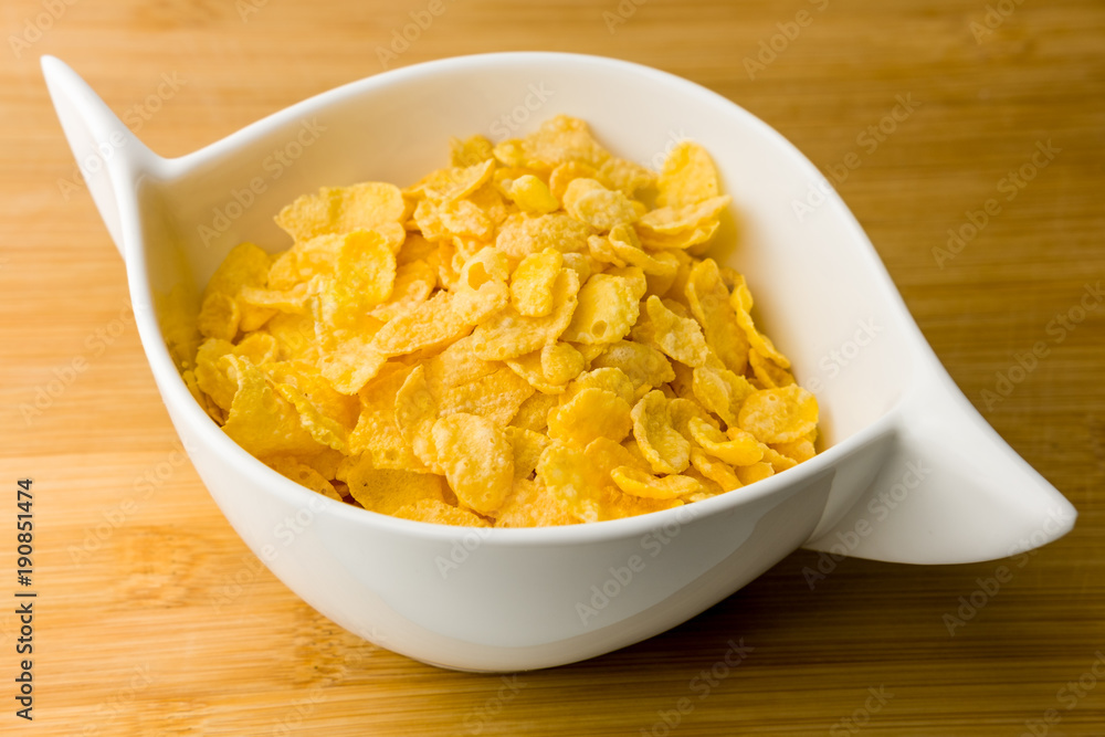 white bowl of cornflakes white bowl of cornflakes