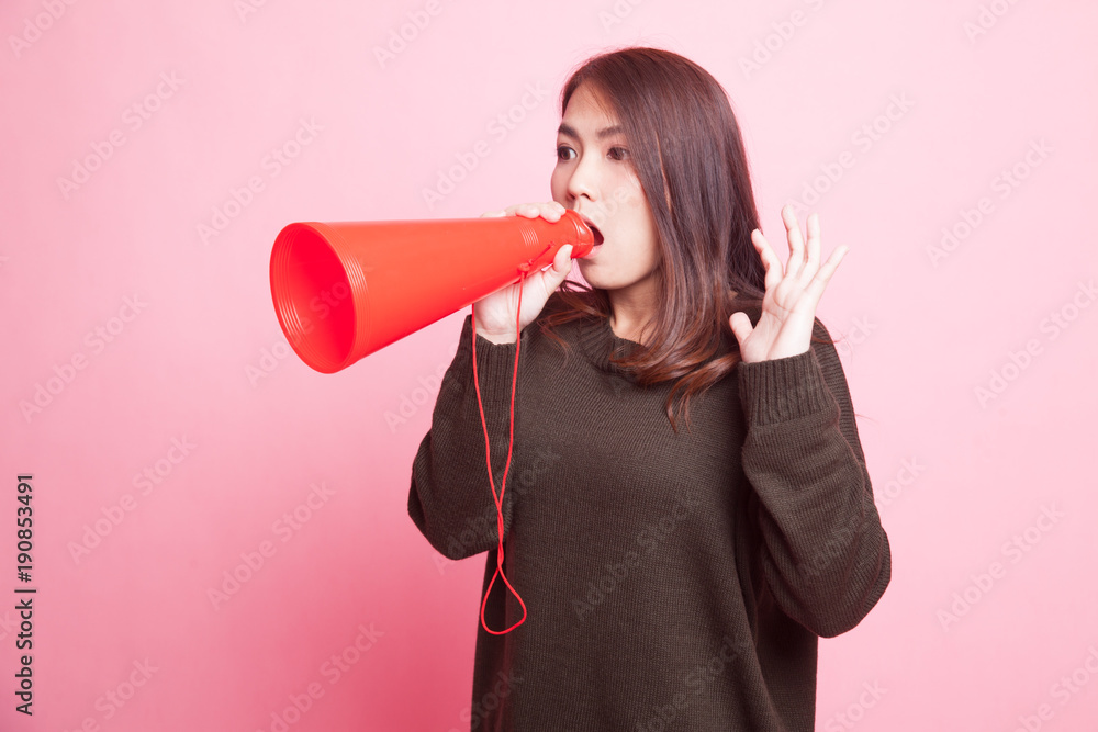 Beautiful young Asian woman announce with megaphone. Beautiful young Asian woman announce with megaphone.
