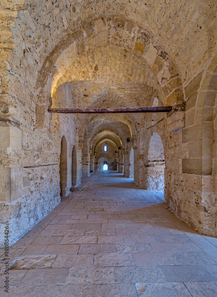 Naklejka premium Passage at the Citadel of Qaitbay, an old historical castle in Alexandria, Egypt, a fifteen century defensive fortress located on the Mediterranean sea coast