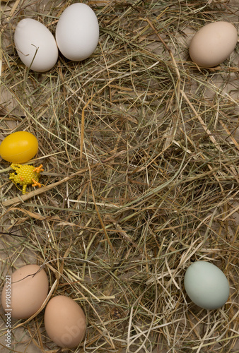 easter eggs in straw with chisel from beads photo