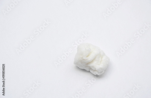 wet facial tissue paper crumbling on white background