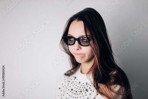 Young beautiful woman with 3d glasses, virtual reality, cinema.