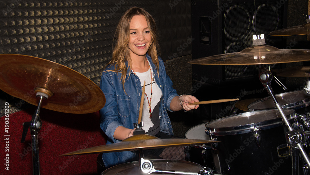 Fototapeta premium The women plays drums